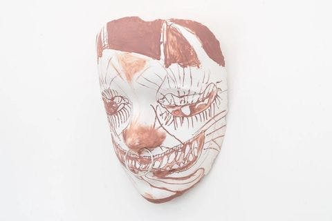 Kitty Mask <br /> oil stick, fiberglass, latex, and plaster 42 x 34 x 18 in. 2021